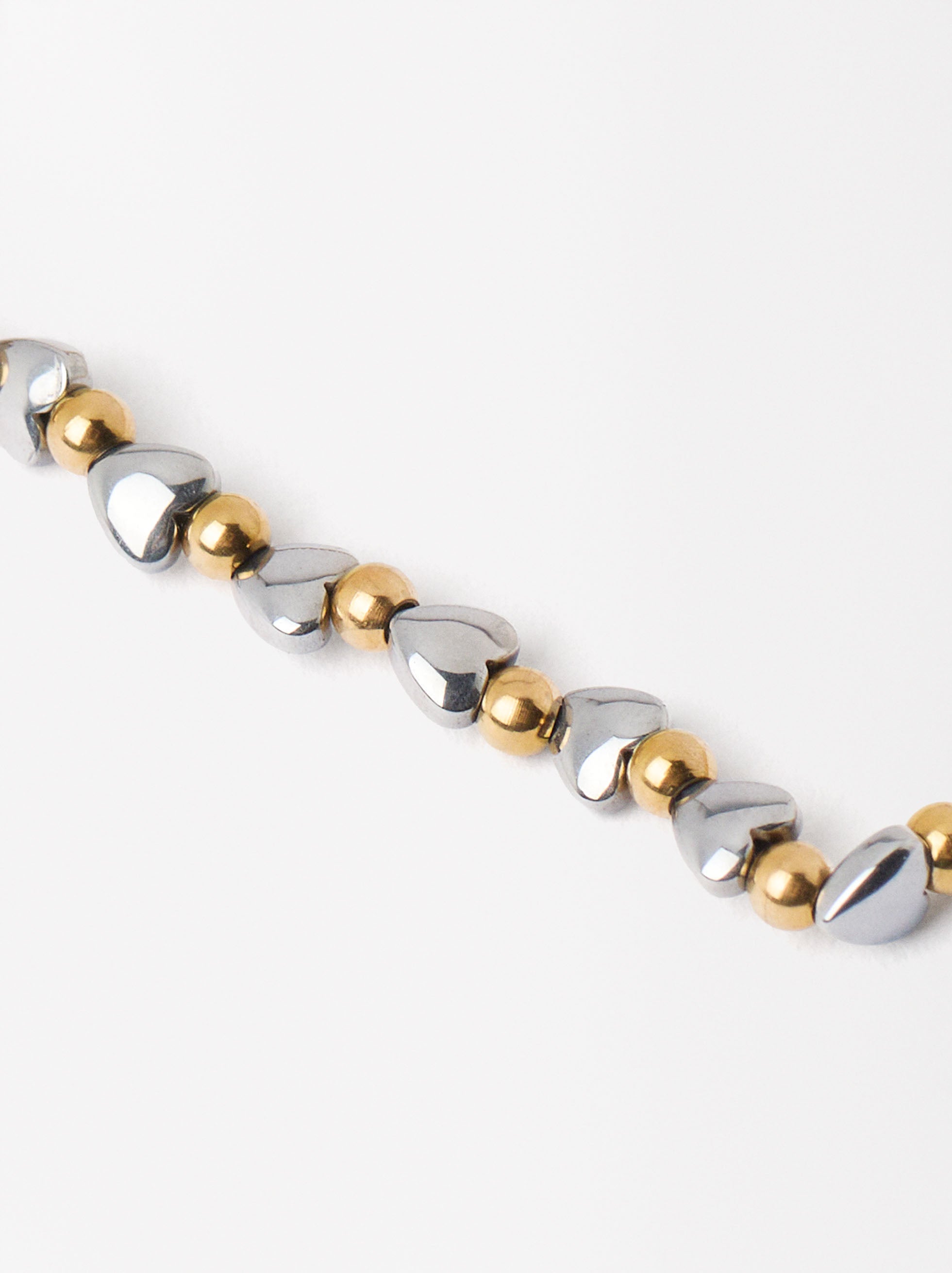 Pulsera Elástica Con Corazones Bicolor - Acero Inoxidable