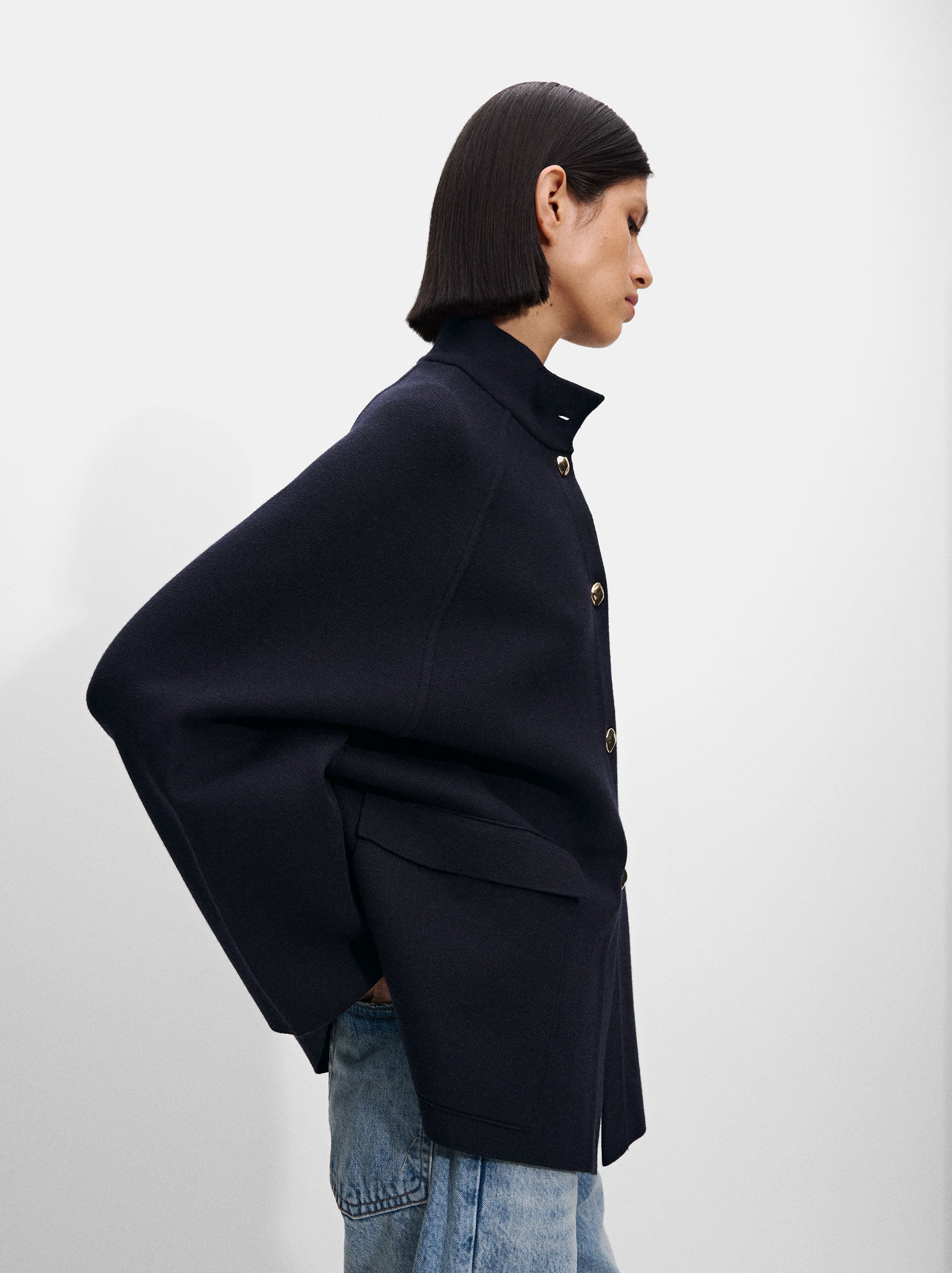 Poncho De Punto De Cuello Alto