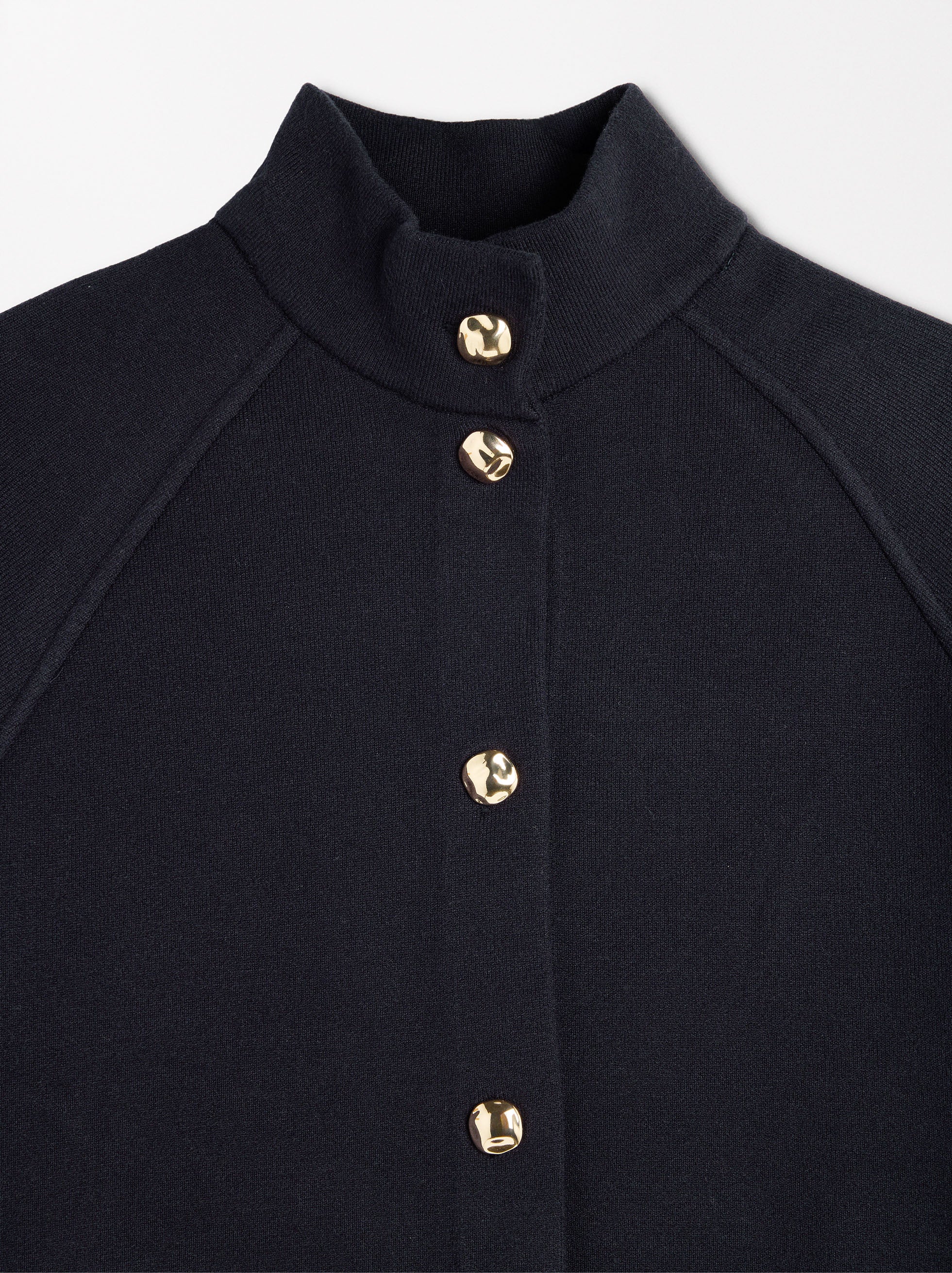 Poncho De Punto De Cuello Alto