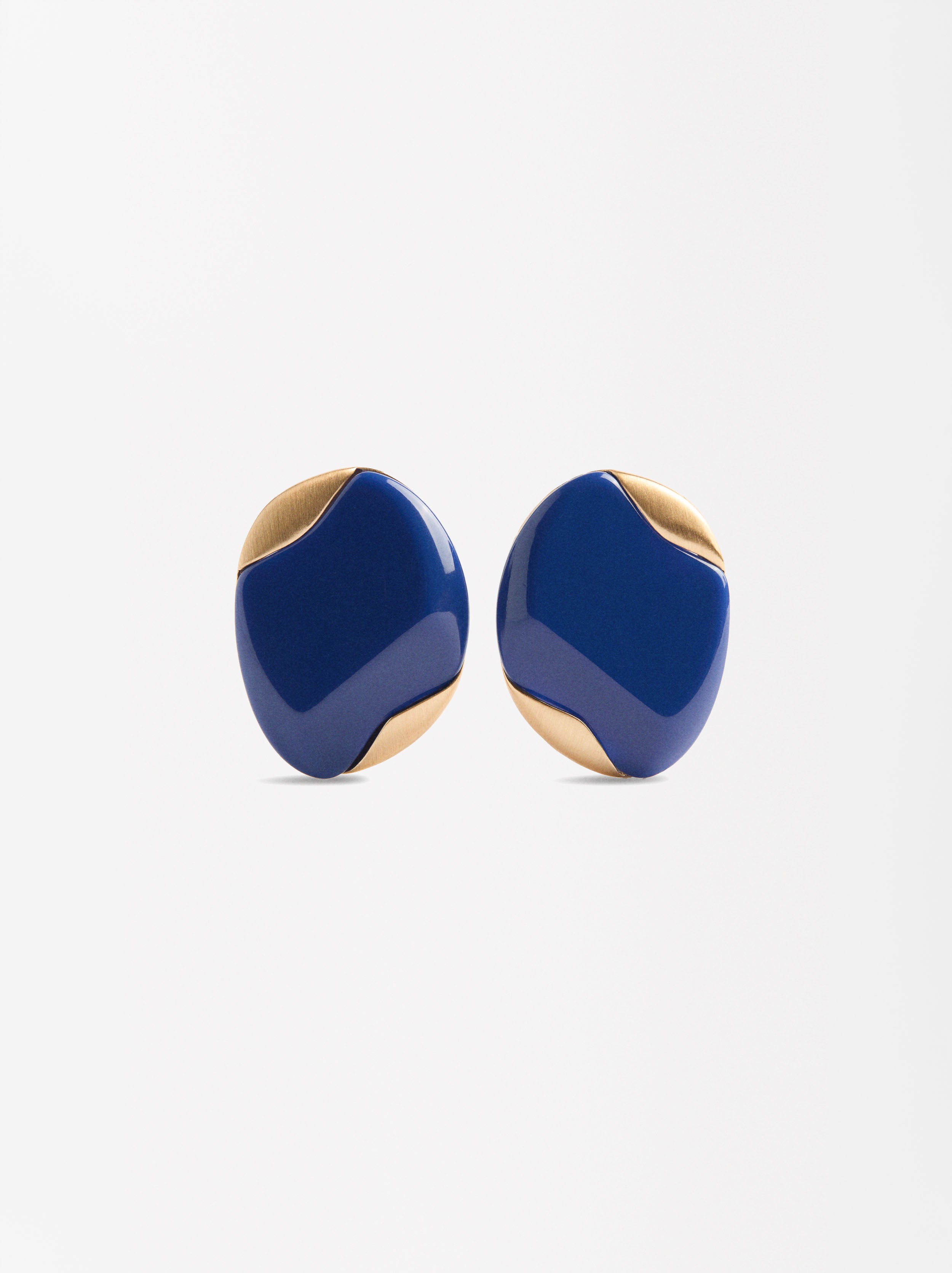Aretes Ovalados Con Detalles Metálicos