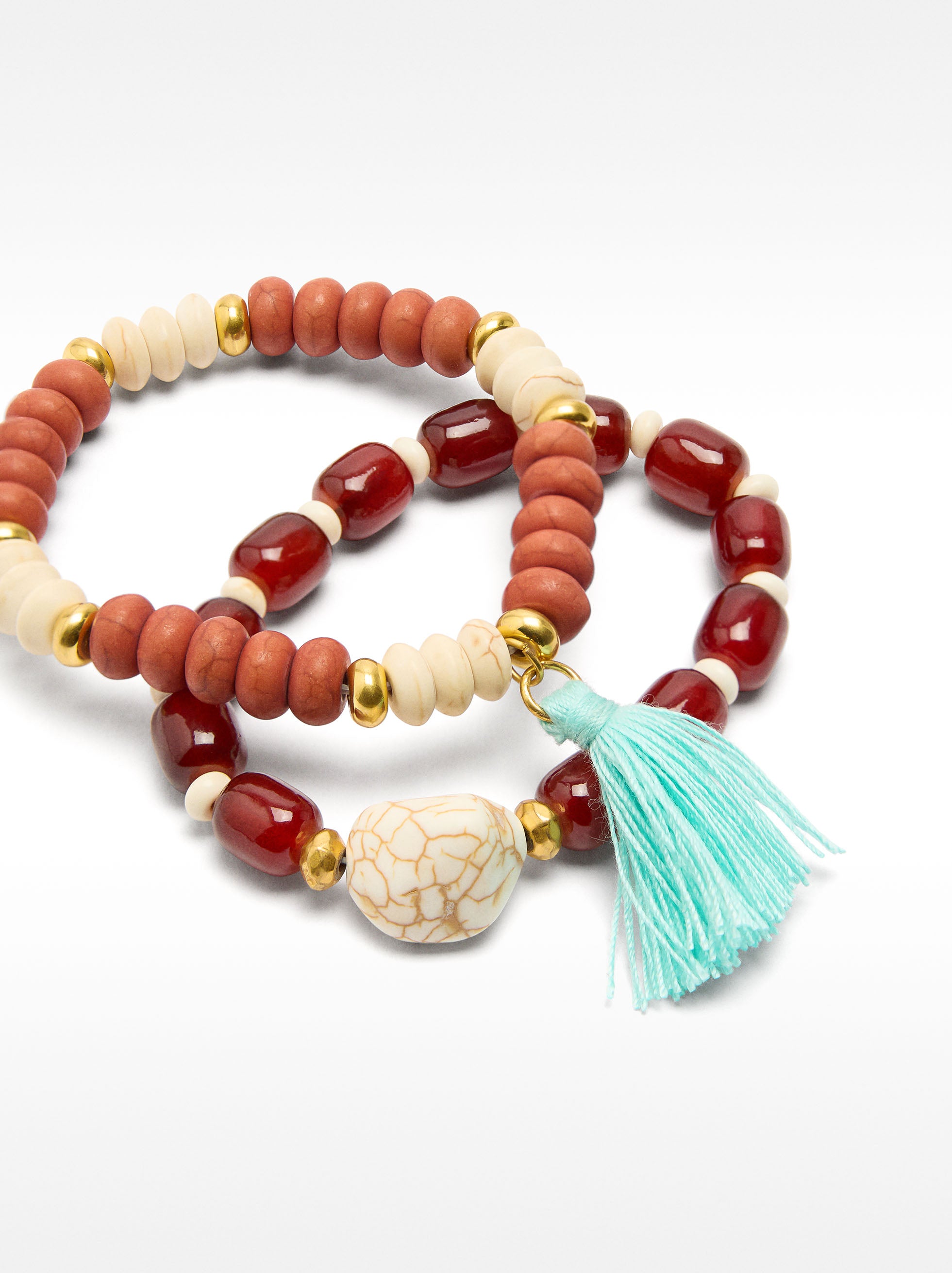 Set De Pulseras Elásticas Con Borlas