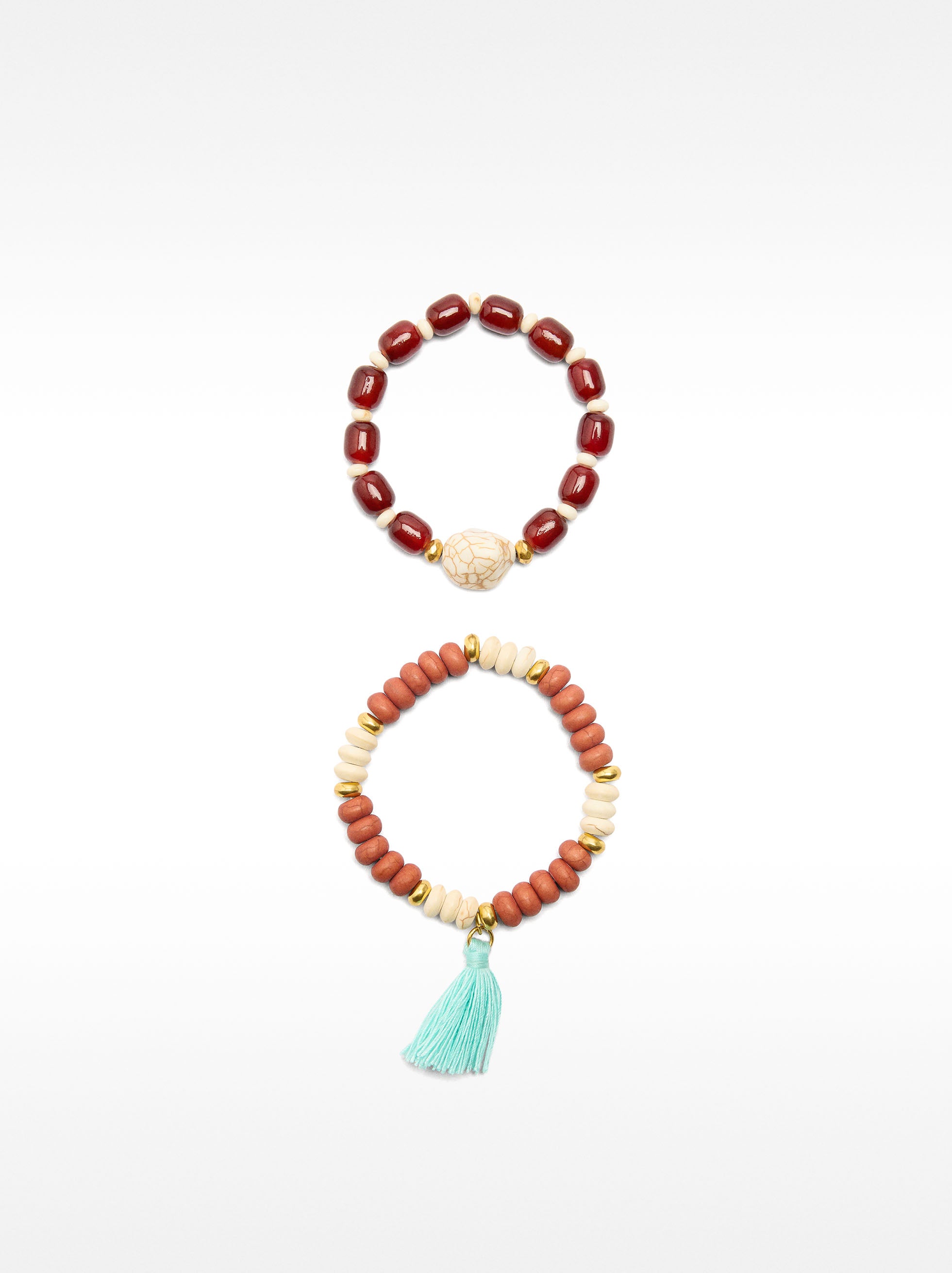 Set De Pulseras Elásticas Con Borlas