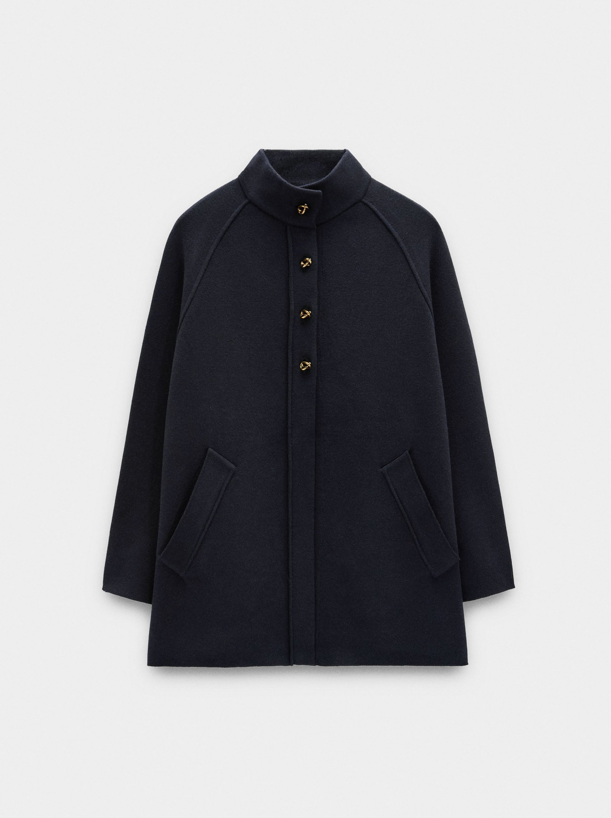 Poncho De Punto Con Cuello Alto