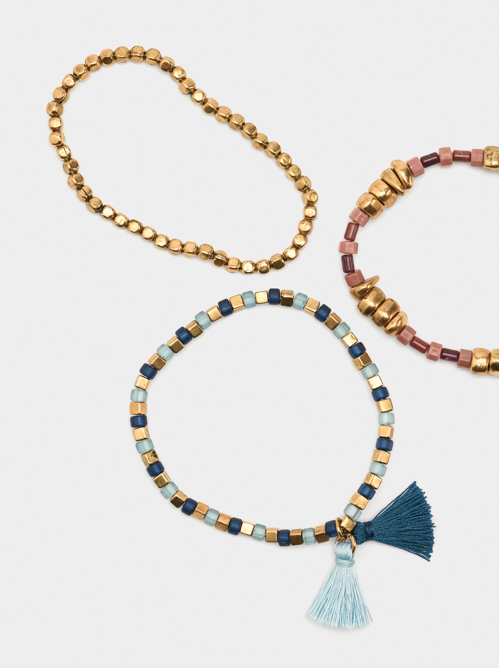 Set De Pulseras Elásticas Con Piedras Y Borlas
