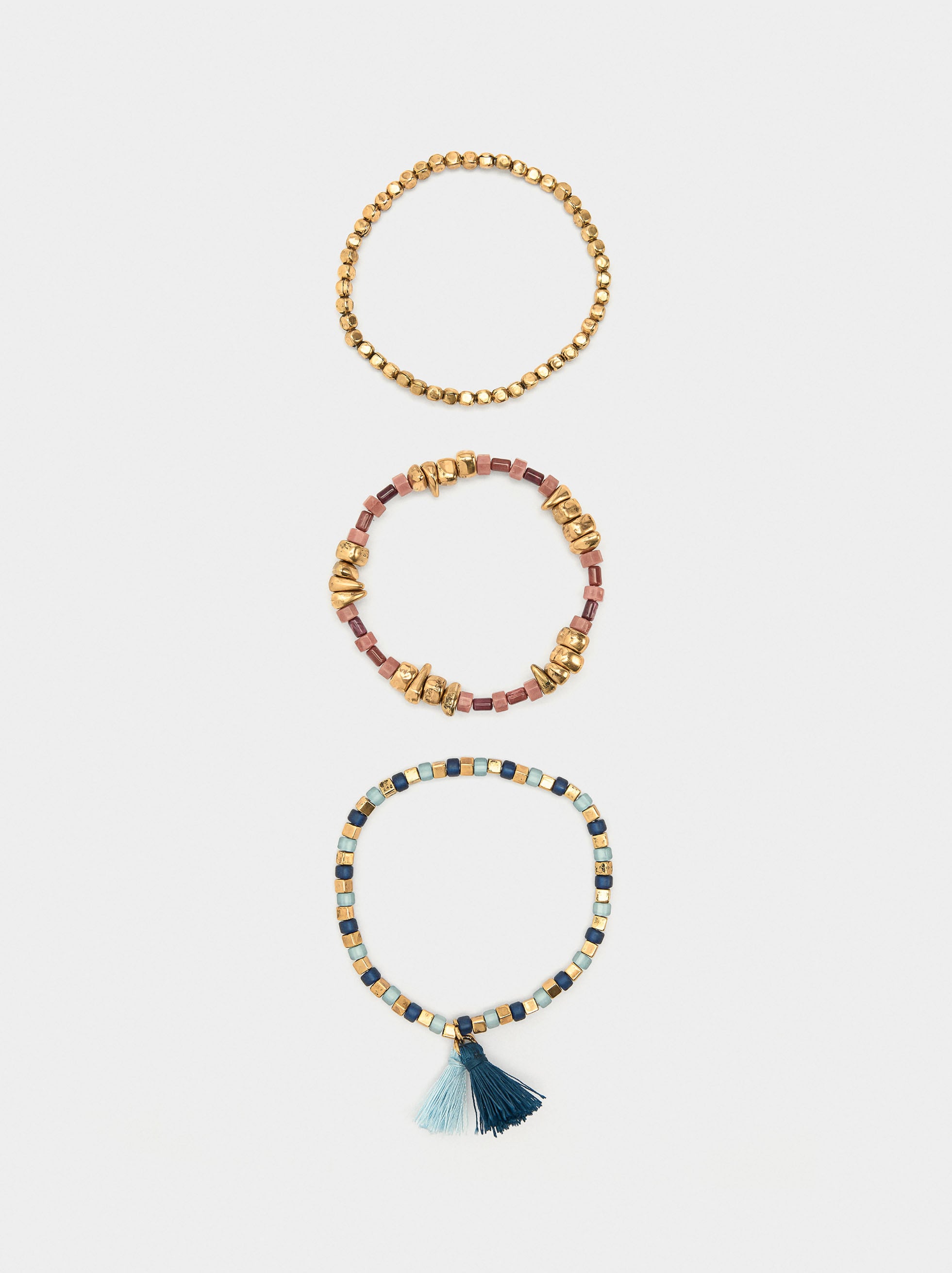 Set De Pulseras Elásticas Con Piedras Y Borlas