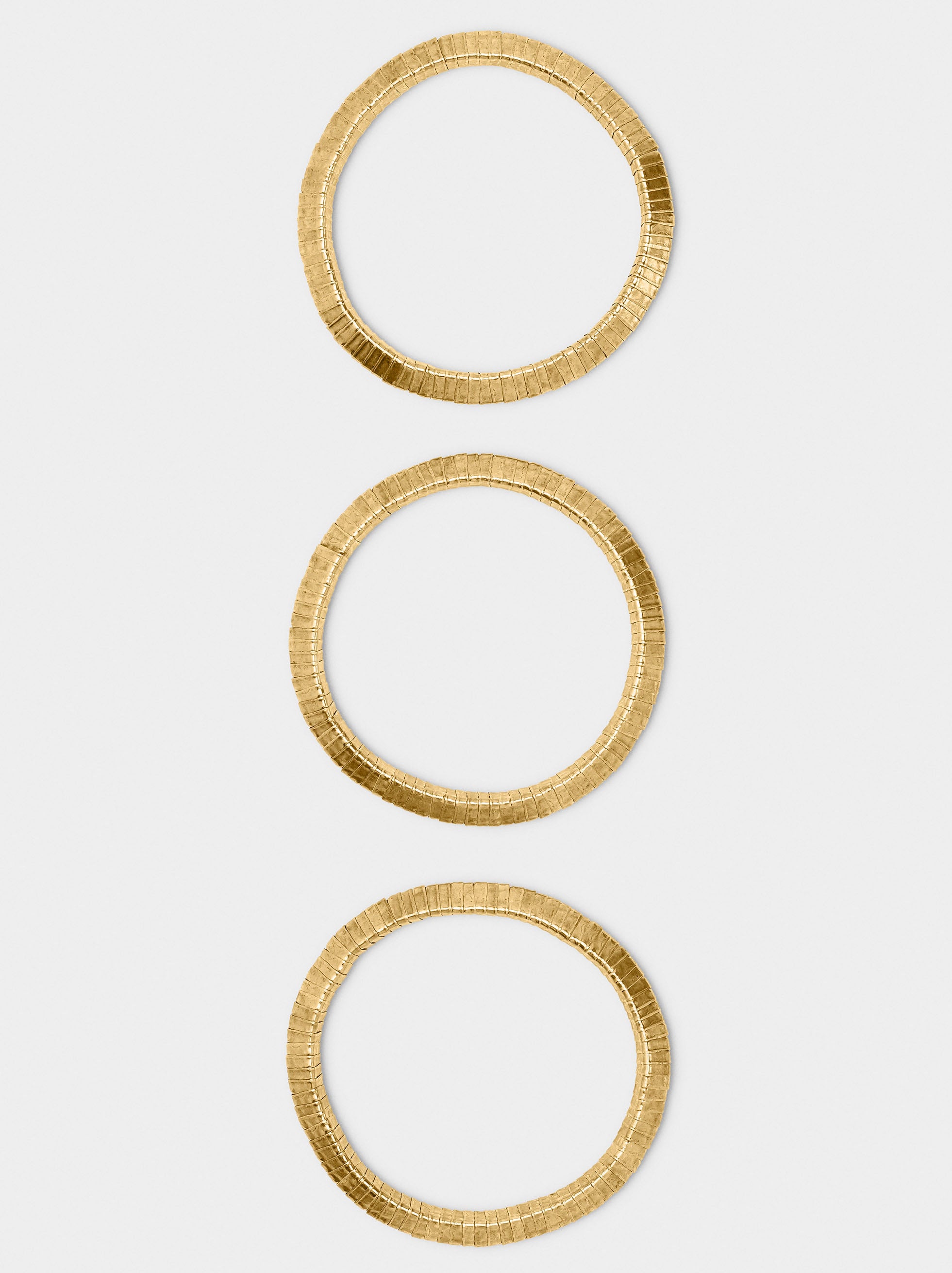 Set De Pulseras Elásticas Doradas