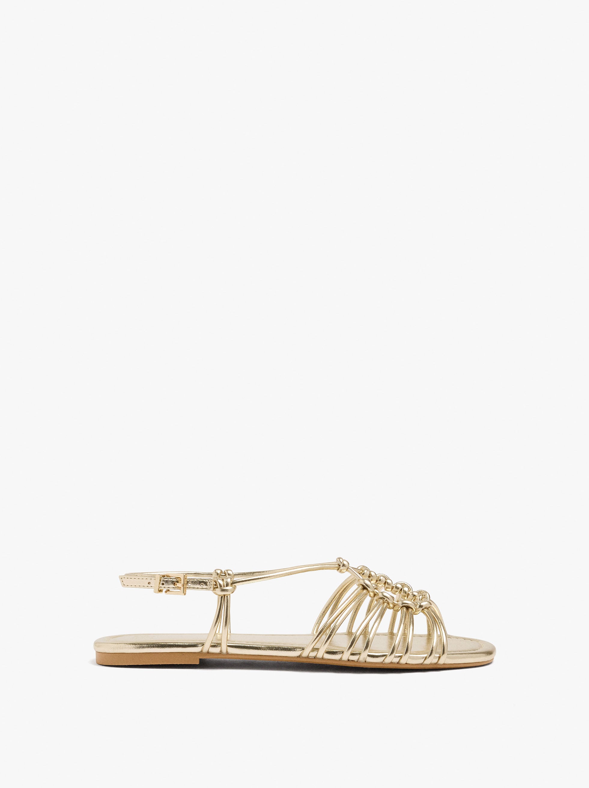 Sandalias Planas Metalizadas Con Nudos