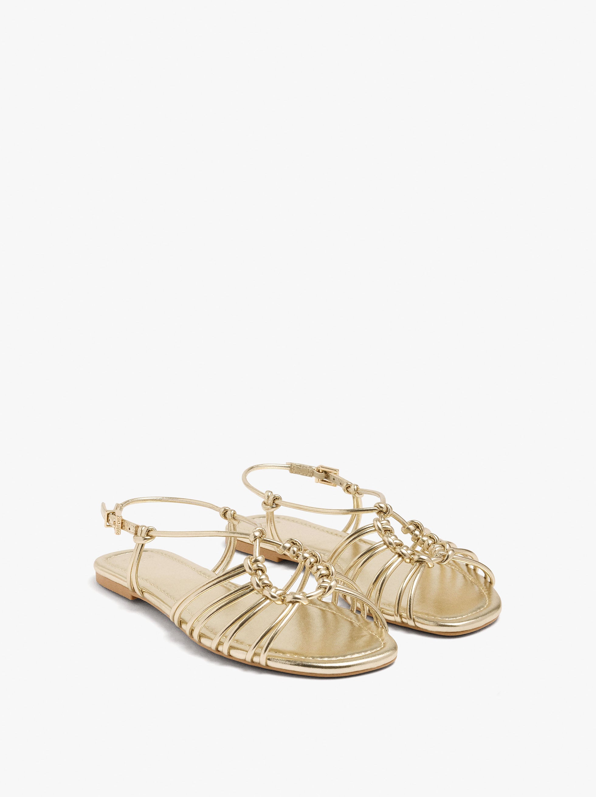 Sandalias Planas Metalizadas Con Nudos
