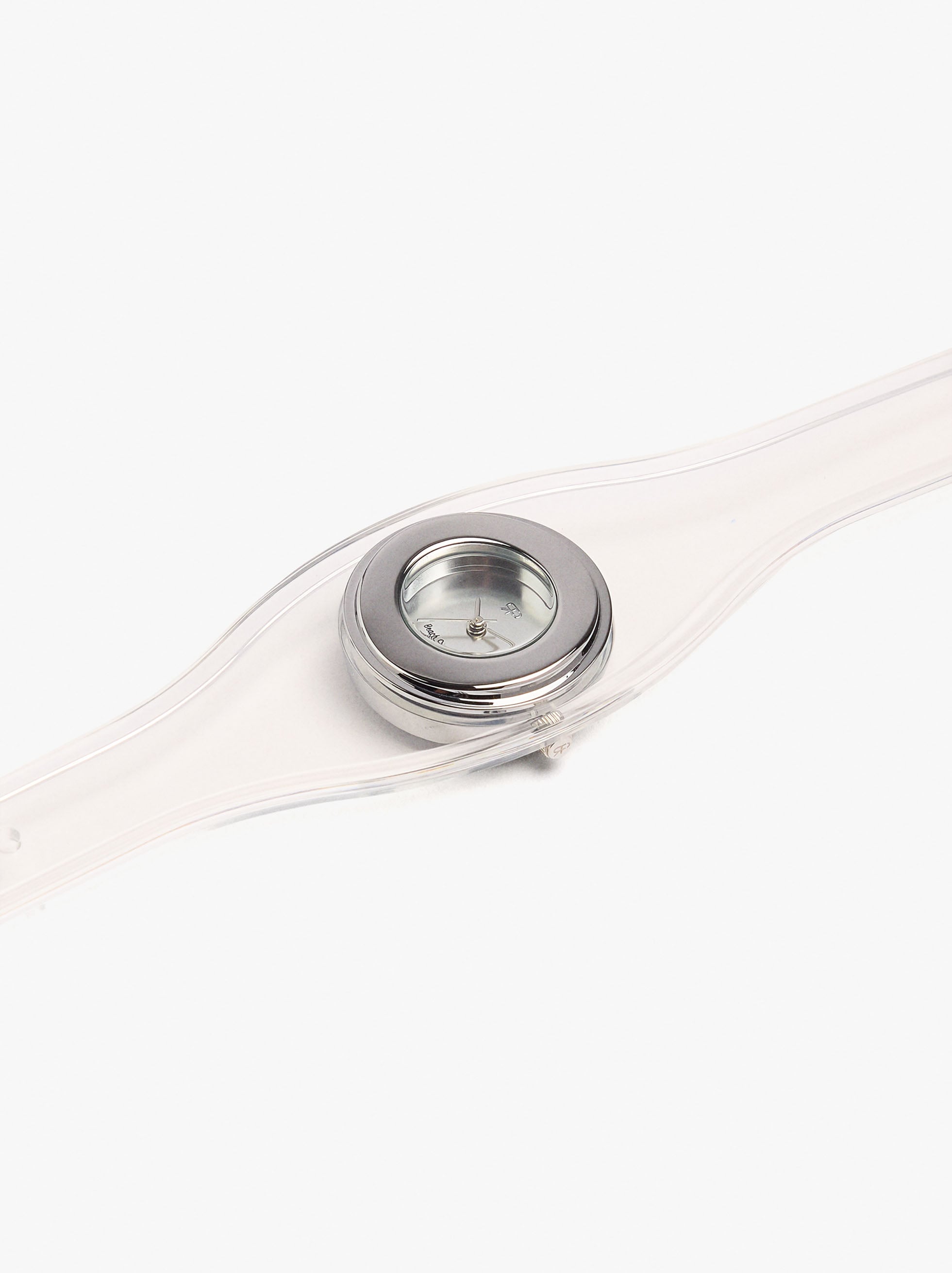Reloj Redondo Con Pulsera Transparente