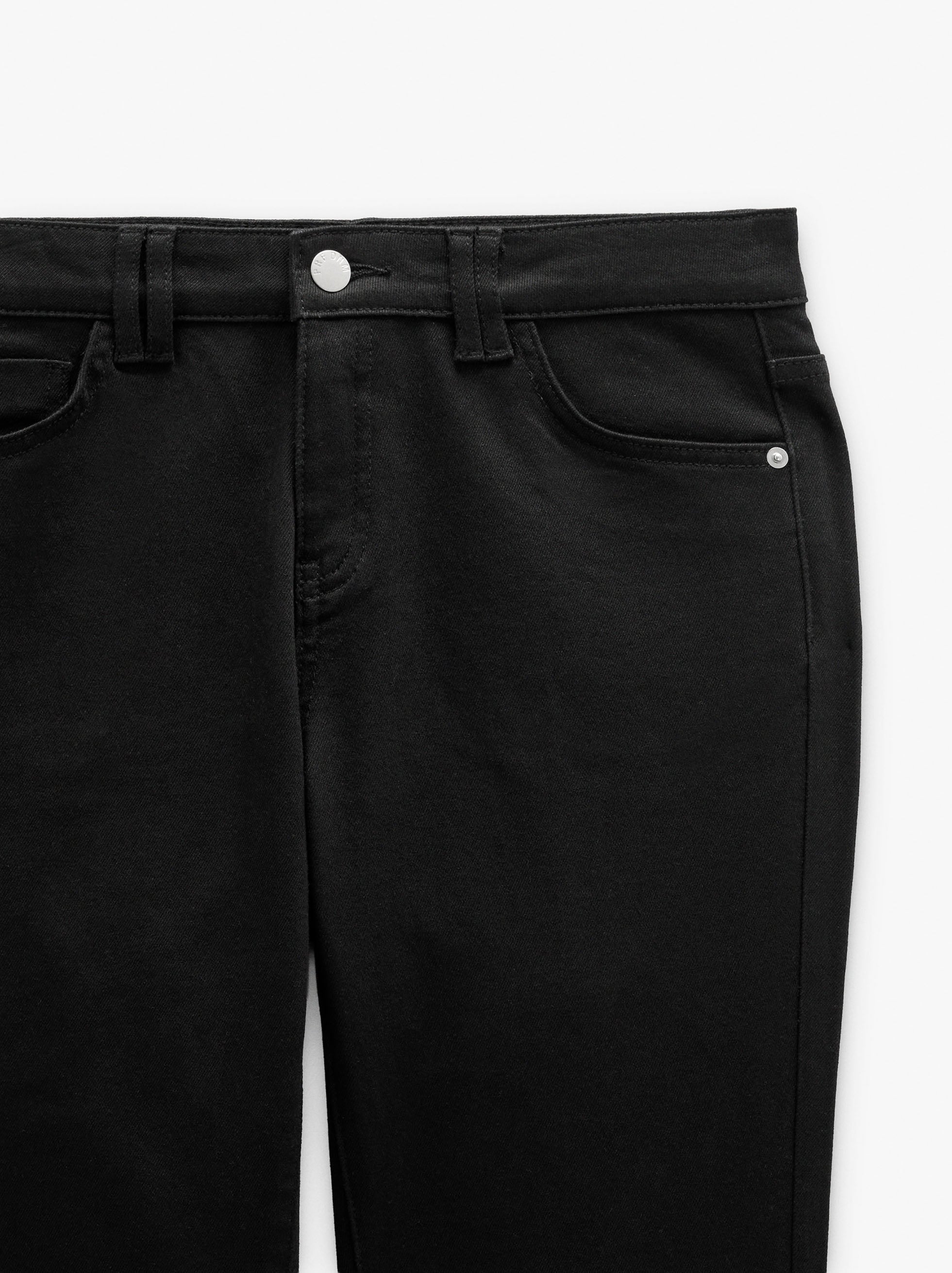 Pantalón Vaquero Bajo Con Cierre De Cremallera